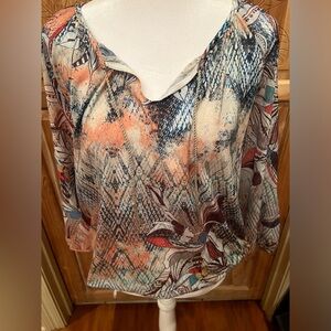 Ladies, print blouse with tassel tie and an elastic bottom